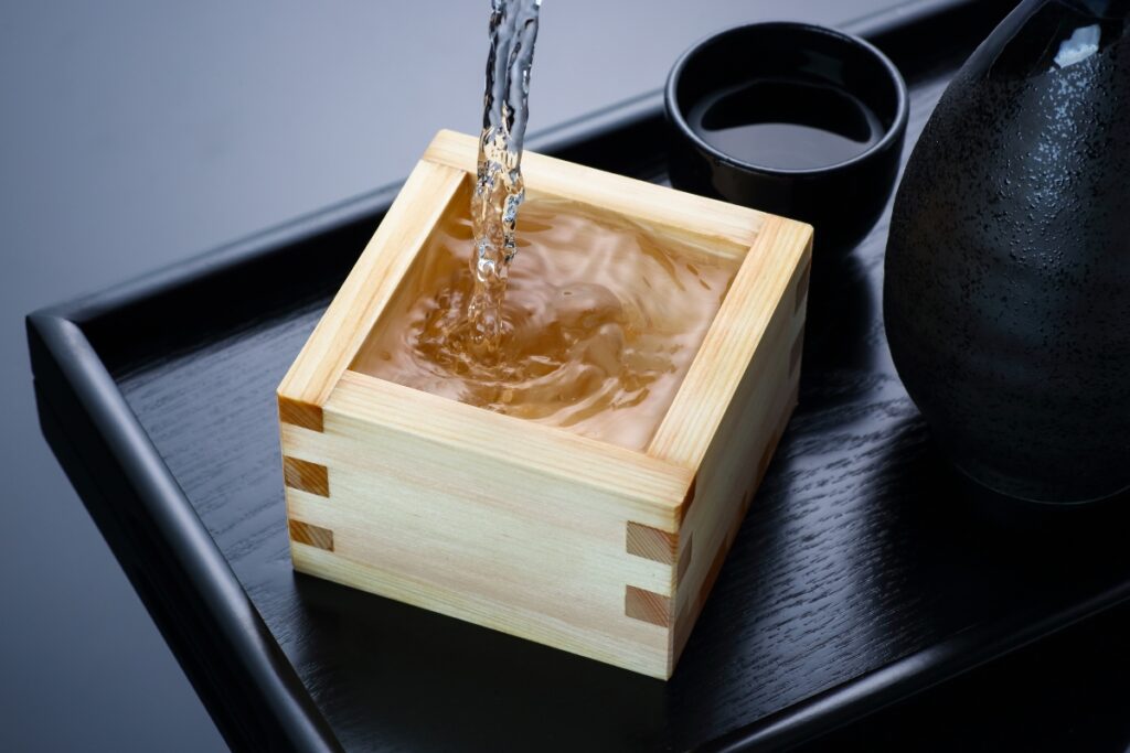 Sake Pouring into a Cup