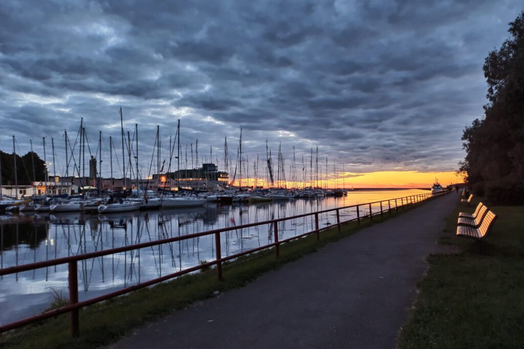 Breathtaking Sunset Over Pirita Beach Under Cloudy Skies