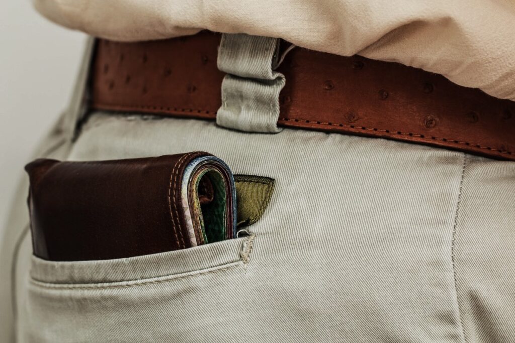 Closeup of a back pocket with a wallet inside